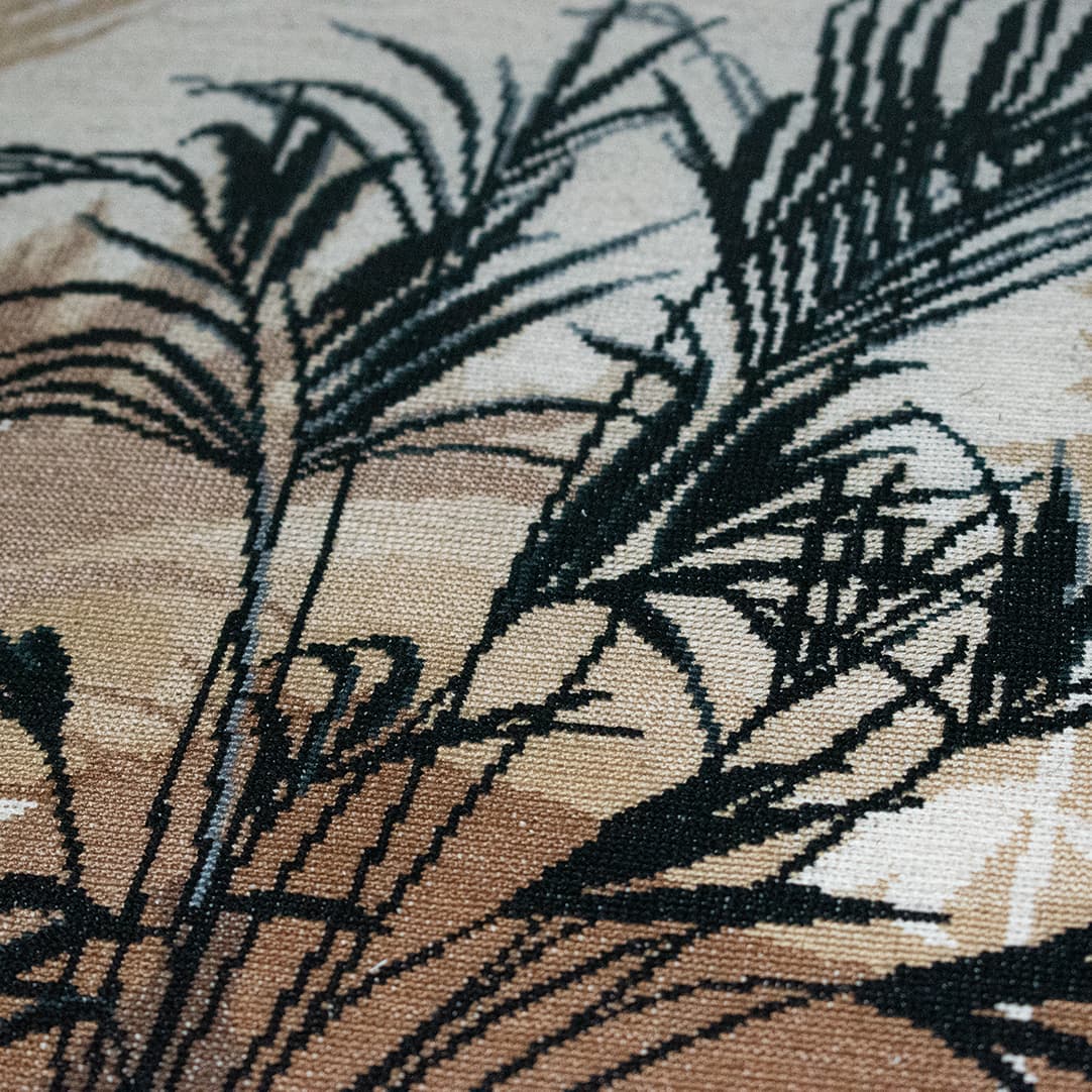 Close-up fragment of “Palm Triptych — Centre”: the texture of hand-stitched crosses