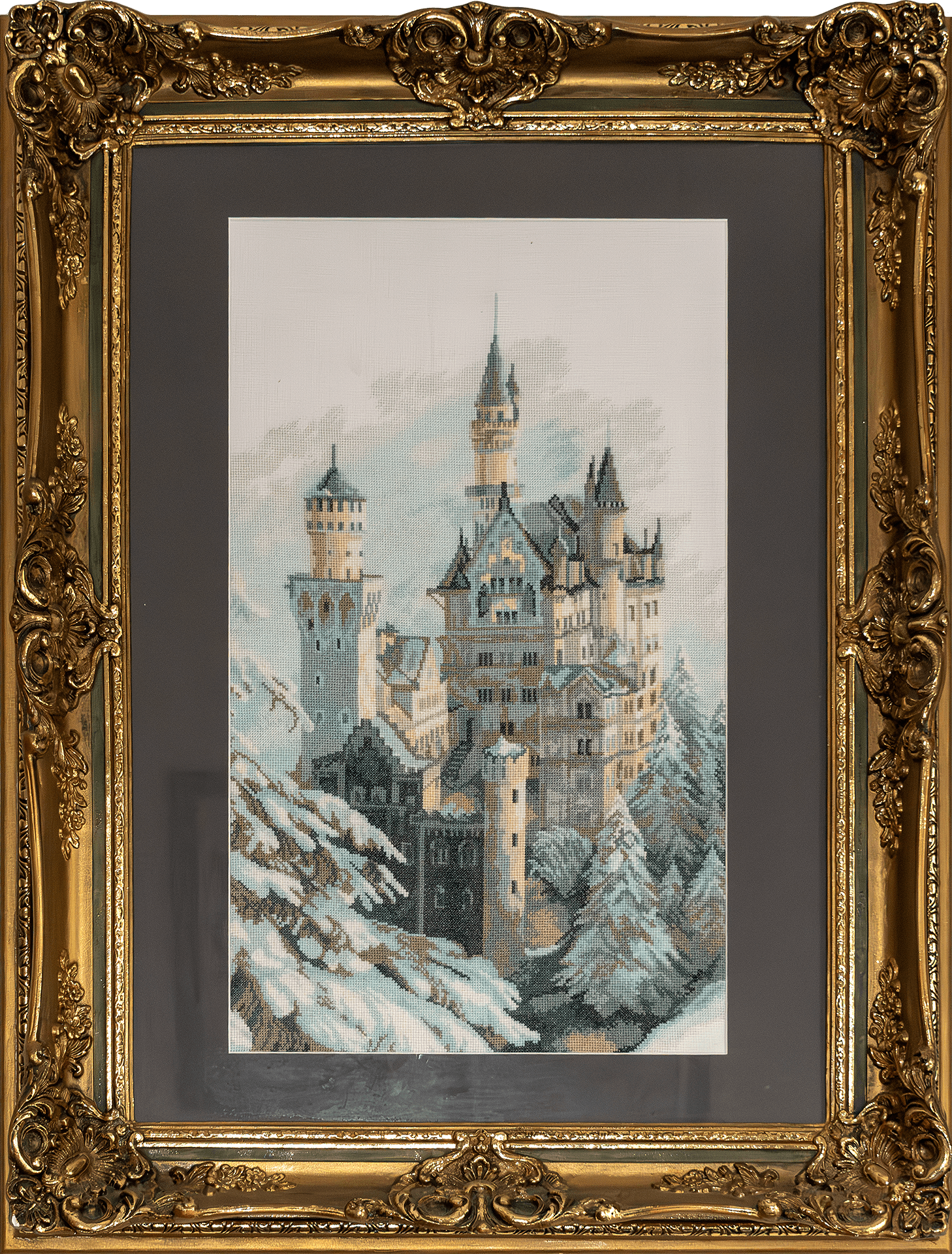 Embroidered Neuschwanstein castle in winter, gilt frame with dark mat