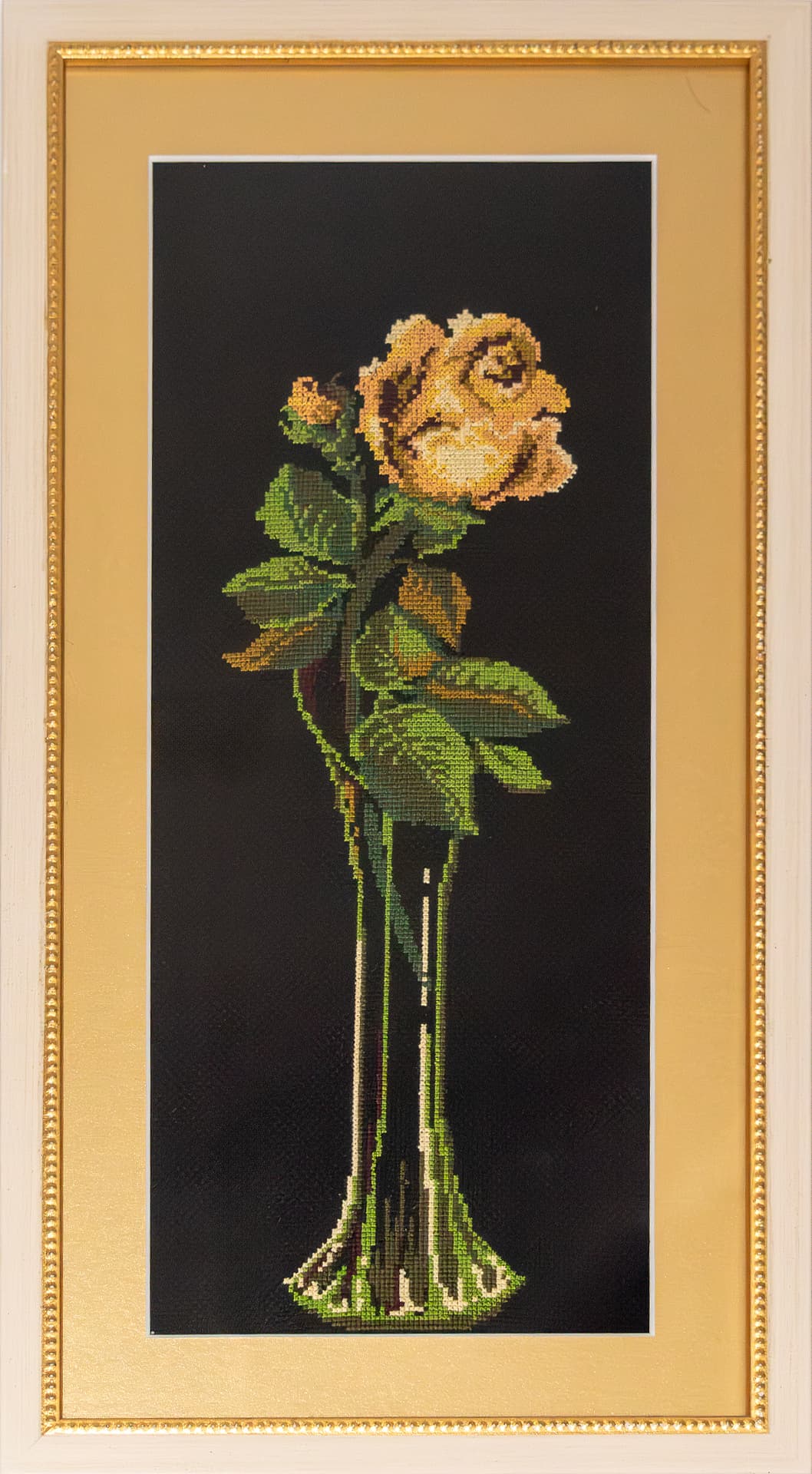 Embroidered amber rose on black canvas in a narrow gilt frame