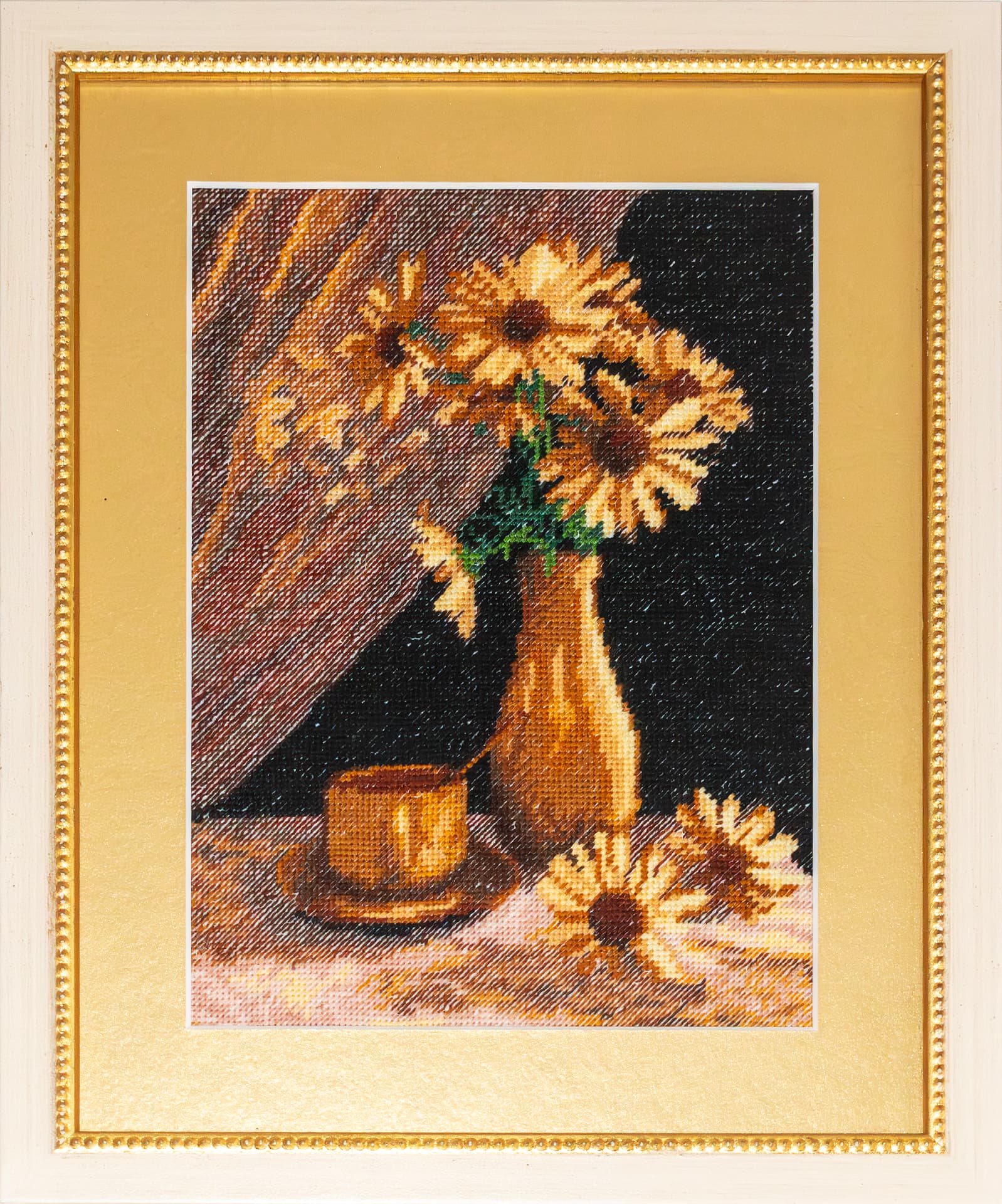 Embroidered sunflowers in a jug with a cup, golden frame