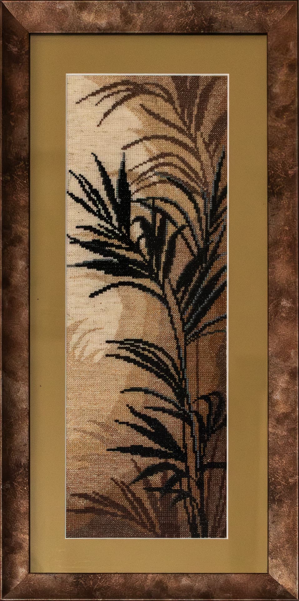 Right panel of an embroidered palm triptych in a bronze frame